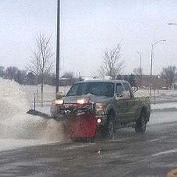Anderson's Mowing - a snow plow clearing a street - Snow Removal Near Me - Hartford, South Dakota Anderson's Mowing - a snow plow clearing a street - Snow Removal Near Me - Hartford, South Dakota