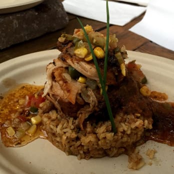 Vic & Al's - Cochin de Lait (pork) on dirty rice - Cajun/Creole Near Me - Austin, Texas Vic & Al's - Cochin de Lait (pork) on dirty rice - Cajun/Creole Near Me - Austin, Texas