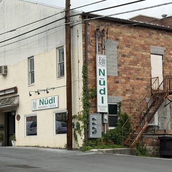 Nūdl - Entry from the rear of the building across from a big parking lot - Asian Fusion Near Me - Bedford, Pennsylvania Nūdl - Entry from the rear of the building across from a big parking lot - Asian Fusion Near Me - Bedford, Pennsylvania