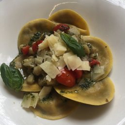 I can't remember what the dish was called, but it was a type of stuffed pasta with tomatoes and eggplant. Delicious!
