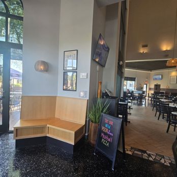 Crust & Craft - Seating area next to the bar - Pizza Near Me - Greensboro, North Carolina Crust & Craft - Seating area next to the bar - Pizza Near Me - Greensboro, North Carolina