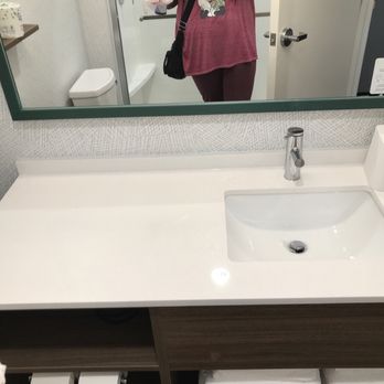 Home2 Suites by Hilton Frankenmuth - Of your sink with towels toilet paper and hair dryer - Hotels Near Me - Frankenmuth, Michigan Home2 Suites by Hilton Frankenmuth - Of your sink with towels toilet paper and hair dryer - Hotels Near Me - Frankenmuth, Michigan