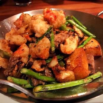 P.F. Chang's - "Surf and Turf" Fried Lobster tail, Filet mignon, roasted potatoes, asparagus, shiitake mushrooms - Asian Fusion Near Me - Greensboro, North Carolina P.F. Chang's - "Surf and Turf" Fried Lobster tail, Filet mignon, roasted potatoes, asparagus, shiitake mushrooms - Asian Fusion Near Me - Greensboro, North Carolina