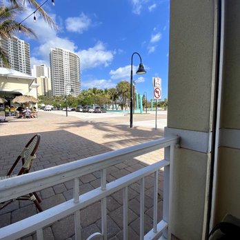 Two Drunken Goats - a view of the beach from a balcony - Seafood Near Me - Riviera Beach, Florida