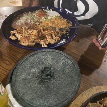 Los Costeños Restaurant - a man sitting at a table with a plate of food - Seafood Near Me - Corning, California Los Costeños Restaurant - a man sitting at a table with a plate of food - Seafood Near Me - Corning, California