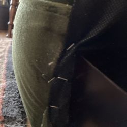 HOM Furniture - These are pictures of the chair we purchased. This chair retailed between $600-$700. Poor job of upholstery, staples used everywhere.