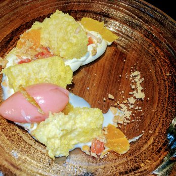 Leña Brava - Citrus Tres Leches - lime crema, 3-citrus salad (tangerine, grapefruit, orange), grapefruit-raspberry sorbet, crispy almonds, turron. - Seafood Near Me - Chicago, Illinois