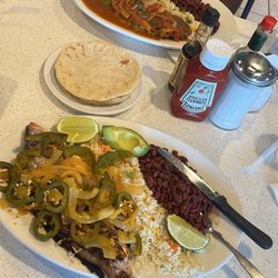 Flores Restaurant - Red Snapper and beef dish