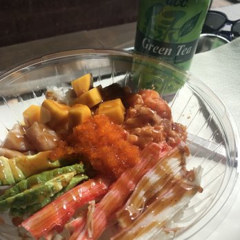 Kissfish - Poke bowl with spicy salmon, yellowtail, kani, fish roe, avocado, mango and yuzu poke dressing. Delicious! - Poke Near Me - Forest Hills, New York