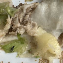 BURRITO DINNER Found this in my burrito, after I ate half of the burrito,  I am so appalled.