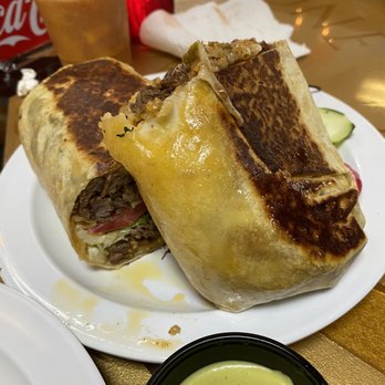 Dona Leti's - Steak fajita burrito. I could only eat half so we took the other half home. - Cocktail Bars Near Me - Houston, Texas