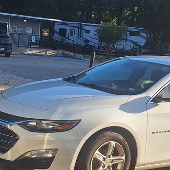 Caliber Collision - 2023 Chevy Malibu hood repaired from Hail Damage - Body Shops Near Me - Arlington, Texas
