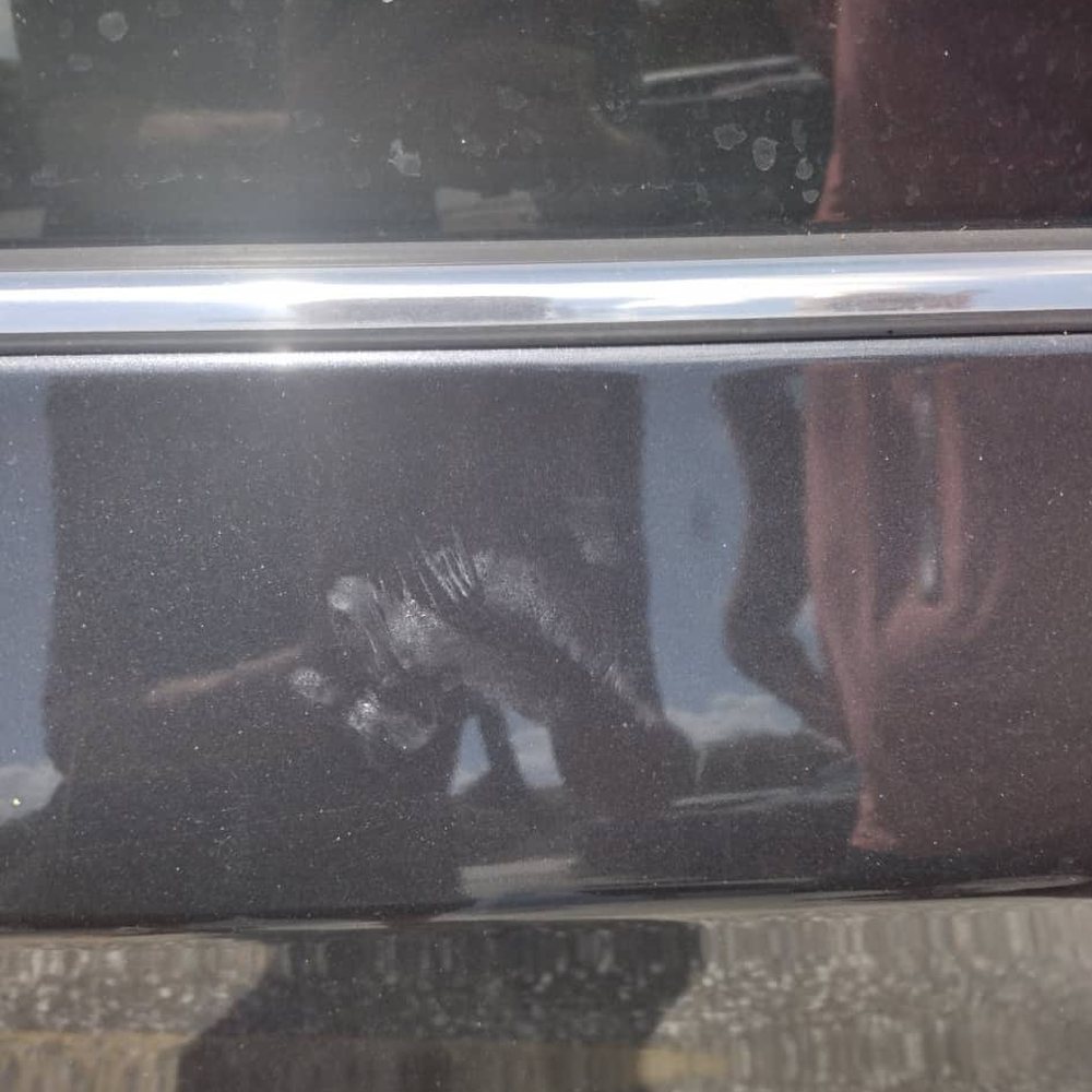 Butch's - passenger side door finger prints and scratch marks - Auto Repair Near Me - Tampa, Florida