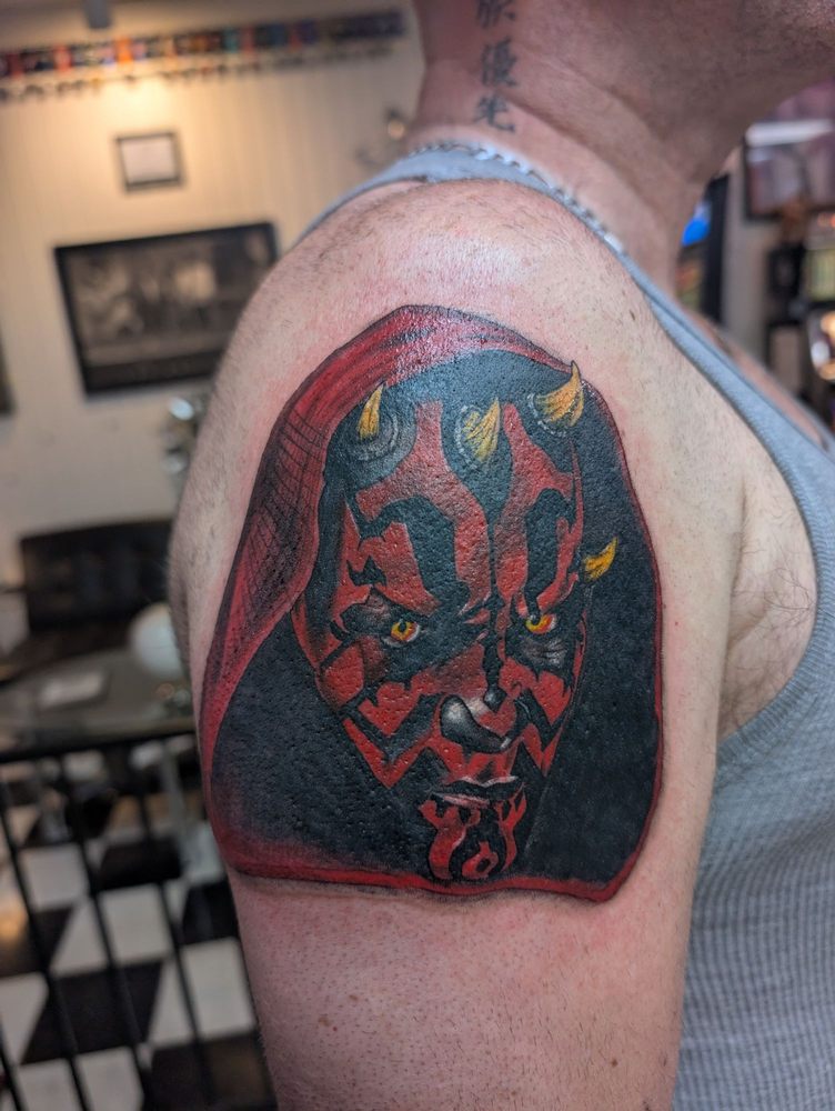 Infamous Ink Tattoo Shop Logo