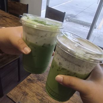 Best World Donuts - On the left Banana Matcha Latte on the right Black Sesame Matcha Latte - Donuts Near Me - Carson, California Best World Donuts - On the left Banana Matcha Latte on the right Black Sesame Matcha Latte - Donuts Near Me - Carson, California
