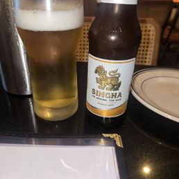Singha and ice cold glass. Singha and ice cold glass.