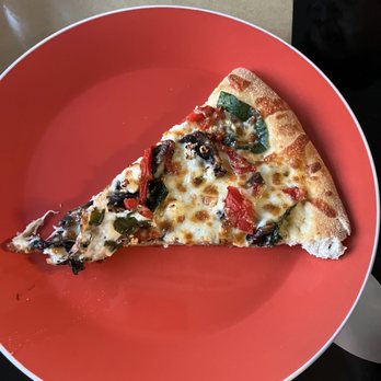 La Villa Restaurant - a slice of pizza on a red plate - Mexican Near Me - Washington, DC, District of Columbia