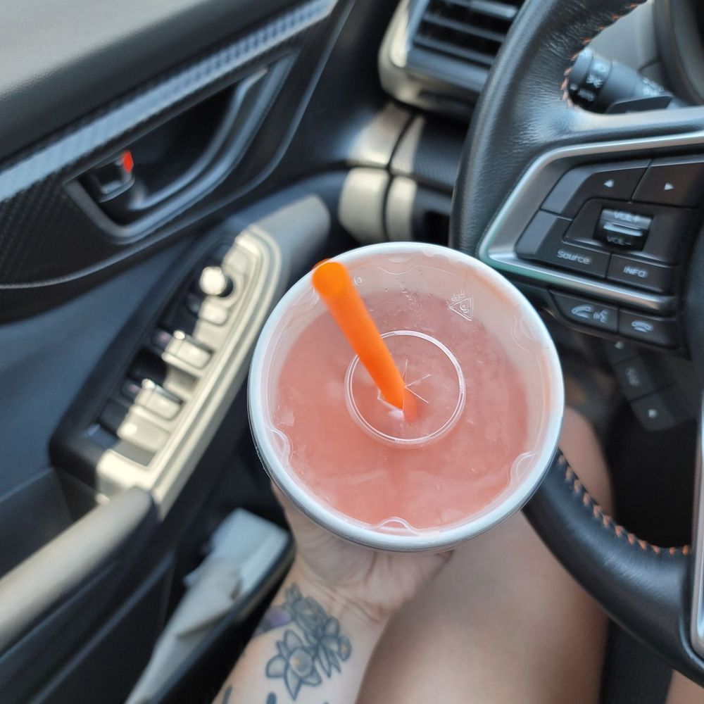 Jamba - a person holding a drink in a car - Juice Bars & Smoothies Near Me - Colorado Springs, Colorado Jamba - a person holding a drink in a car - Juice Bars & Smoothies Near Me - Colorado Springs, Colorado