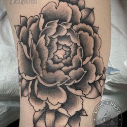 Peony, on the knee by @ghastlycassie Spots fill up quick! Come by our shop for a free consultation and booking