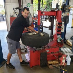 Ross Automotive - Raymond changing my tires.