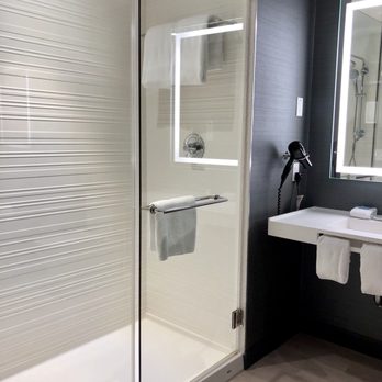 AC Hotel by Marriott Denver Downtown - Bathroom in a Guest Room at the AC Hotel Denver Downtown - Hotels Near Me - Denver, Colorado AC Hotel by Marriott Denver Downtown - Bathroom in a Guest Room at the AC Hotel Denver Downtown - Hotels Near Me - Denver, Colorado