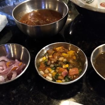 Bronco Mexican Grill - Regular red salsa on top (mild), left is habanero (hella spicy), center is mango salsa (mild), and tomatillo on the right (medium spicy) - Mexican Near Me - Chesapeake, Virginia