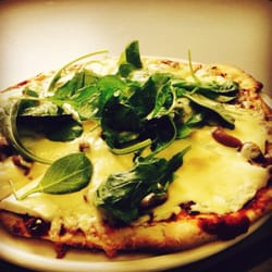 Polenta - Pizza De Cabra con rúcula