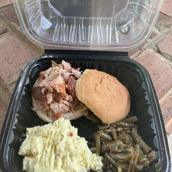Pulled BBQ chicken with rolls, potato salad, green beans.
