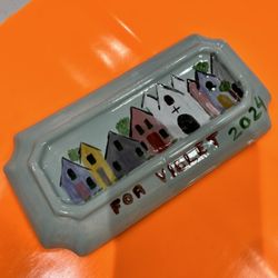 Lets Go Paint Pottery - A small tray on the bottom/back.