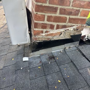 Alpha Omega Home Remodeling - Demolition of chimney brick courses and flashing. - General Contractors Near Me - Bloomingdale, Illinois Alpha Omega Home Remodeling - Demolition of chimney brick courses and flashing. - General Contractors Near Me - Bloomingdale, Illinois