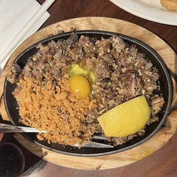 Gerry's Grill - Sizzling Pork Sisig with Egg - Filipino Near Me - Artesia, California Gerry's Grill - Sizzling Pork Sisig with Egg - Filipino Near Me - Artesia, California