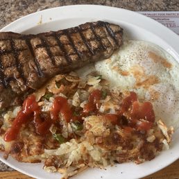 Delicious New York shrimp with eggs and hashbrowns. I added peppers and onions.