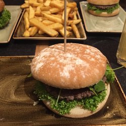 Hans Im Glück - Hans im Glück burger.  Hard cheese, Parma ham (Prosciutto), rocket (arugula), & balsamic vinegar.