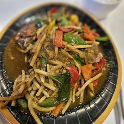 Green Peapod - #1 hot with duck. Not on the regular menu but on the carry out menu. You can get if you ask.
