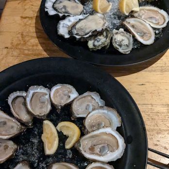 Nomé Izakaya - Oysters! Can't remember which ones but they were all good! The ones on the bottom are the dollar per shuck - Lounges Near Me - Toronto, Ontario Nomé Izakaya - Oysters! Can't remember which ones but they were all good! The ones on the bottom are the dollar per shuck - Lounges Near Me - Toronto, Ontario
