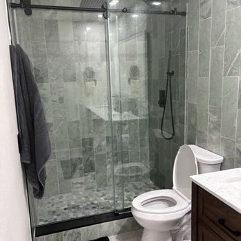 Handyman Lomeli - marble tile install with glass doors and three different shower heads - Handyman Near Me Handyman Lomeli - marble tile install with glass doors and three different shower heads - Handyman Near Me