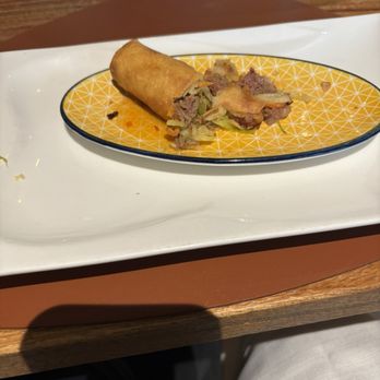 La Dehesa Cafe - Basically.... A Lamb Summer Role courtesy of the house... with a sweet and sour sauce at the bottom. Very good! - Coffee & Tea Near Me - València, V
