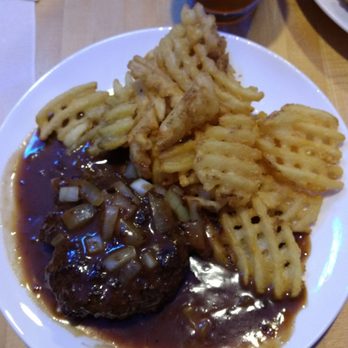 Rumorz Bistro - My Rumorz hamburg steak with waffle fries and gravy. Tastes even better than it looks. Another great item on the menu. - Breakfast & Brunch Near Me - Old Orchard Beach, Maine