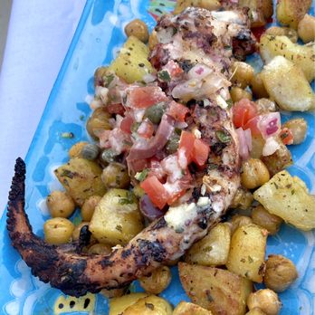 Dua Mediterranean Kitchen - Char-Grilled Octopus w/Potato, Chick Pea, Olive & Tomato - Mediterranean Near Me - Bryn Mawr, Pennsylvania Dua Mediterranean Kitchen - Char-Grilled Octopus w/Potato, Chick Pea, Olive & Tomato - Mediterranean Near Me - Bryn Mawr, Pennsylvania