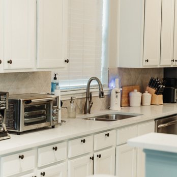Lone Star General Remodeling - Kitchen remodel in Spring TX! Painted cabinets, quartz countertops, and new lighting fixtures! - Flooring Near Me