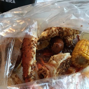 Crackin' Crab Seafood Boil - King crab with corn on the cob, red potatoes, and andouille sausage, covered in Crackin crab mild and lemon pepper spices. - Seafood Near Me - Albuquerque, New Mexico