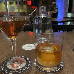 Albuquerque Distilling - Old fashioned with rum and Single-Malt Manhattan. Gilbert Uribe rocking it in the background.