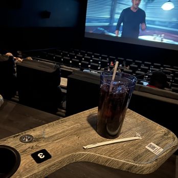 Studio Movie Grill - a glass of soda on a table - Dinner Theater Near Me - Alpharetta, Georgia