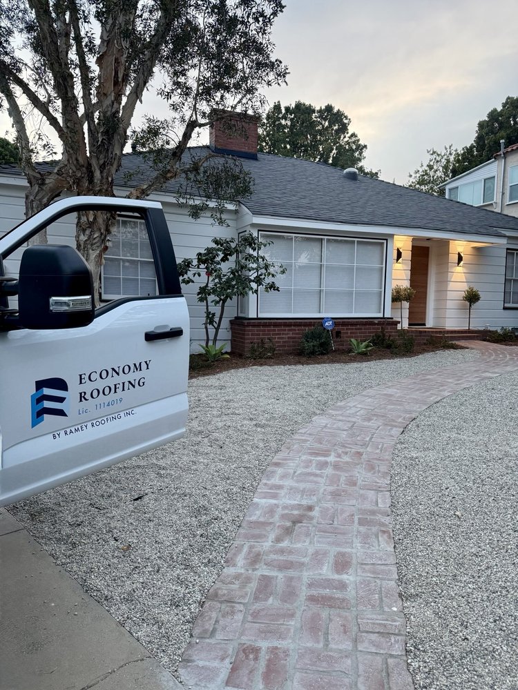 Slide of Economy Roofing