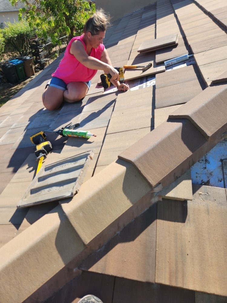 Slide of Rain Proof Roofing & Contracting