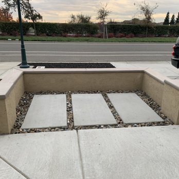 The Rock Source - Front seating/retaining wall with rock bark - Nurseries & Gardening Near Me - Vacaville, California