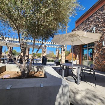 Luna Grill Menifee - Outdoor seating with shade and pretty trees. - Mediterranean Near Me - Menifee, California
