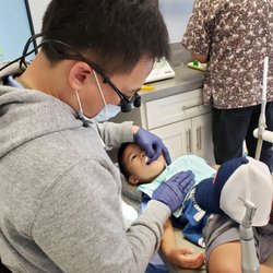 Aina Haina Family Dental - Getting his new filling from Dr. Yoo:)