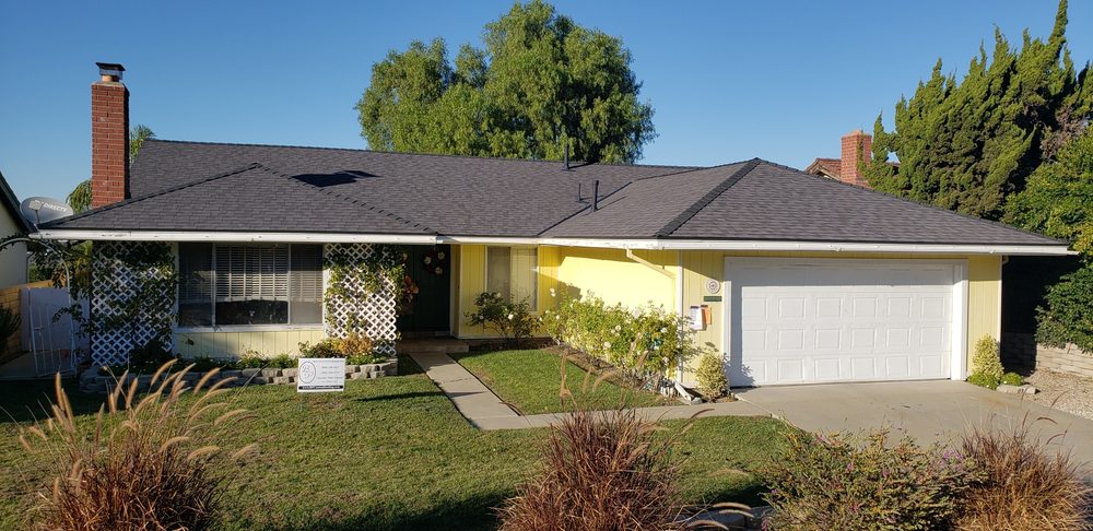 Slide of B.P. Custom Roofing