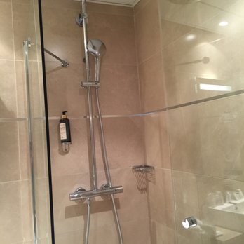 Hotel de l'Empereur - 4th Floor, Room #42, very clean bathroom, but shower doors don't close all the way - Hotels Near Me - Paris, 75